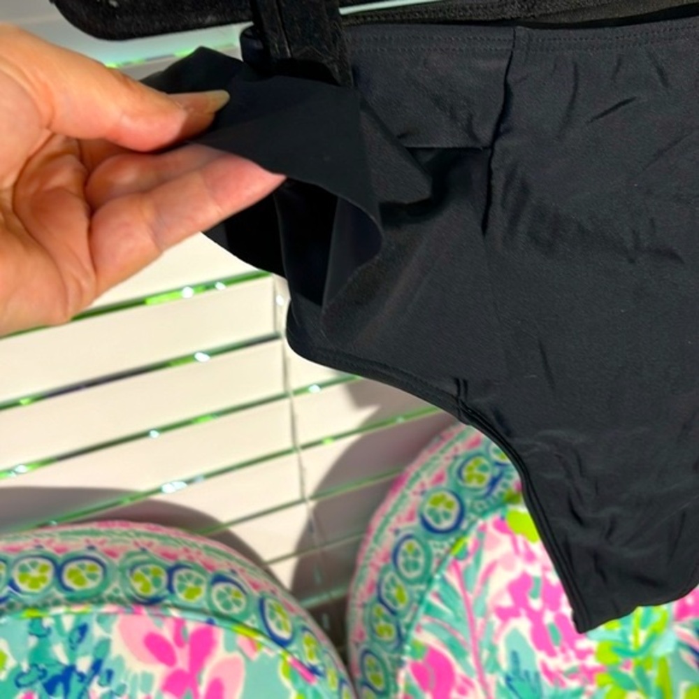 Sporlike black ruffle sides swim bottoms